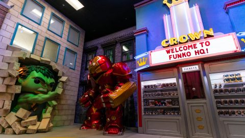 Two large toy characters are displayed next to a sign that says "Welcome to Funko HQ"