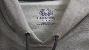 A Fruit of the Loom gray fleece top, close up. 