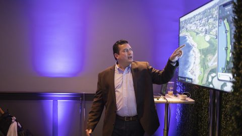 Jack Brown, SVP of Product and Software at Arccos, demonstrates Arccos Caddie at Conversations on AI, a Microsoft event in San Francisco.
