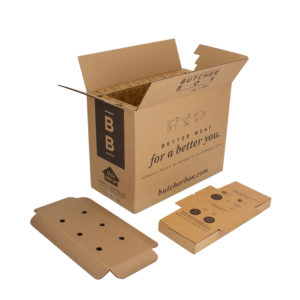 Photo of a ButcherBox cardboard box, made of 95 percent recycled paper, that the company ships its products in.hat ButcherBox ships its products in
