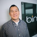 Walter Sun infront of the Bing logo
