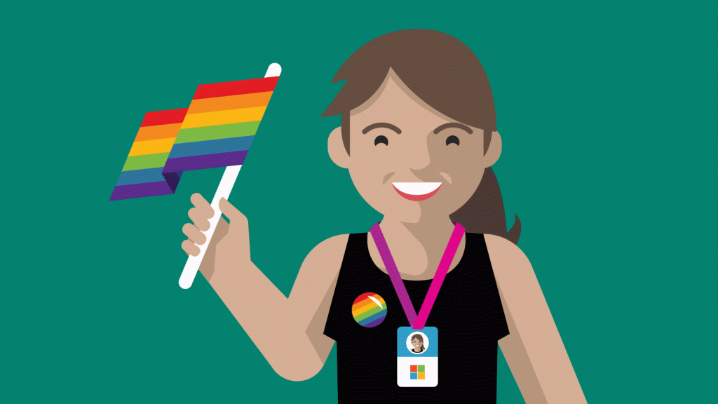 Person who is wearing a Microsoft ID badge and a rainbow button holding a rainbow flag