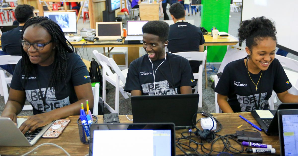 Ramou Jallow, Ghislain Bugingo & Bezawit Kinfe, Microsoft interns working on Teenage Brains hack on the opening day of the 2017 Microsoft Hackathon