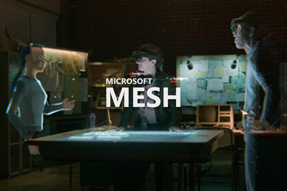 Schriftzug "Microsoft Mesh" vor einem Tisch, an dem Personen gemeinsam mit Avataren arbeiten