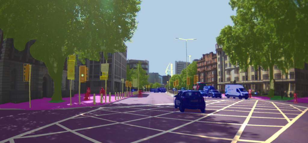 La visión de cómputo muestra un auto que conduce por una calle en la ciudad.