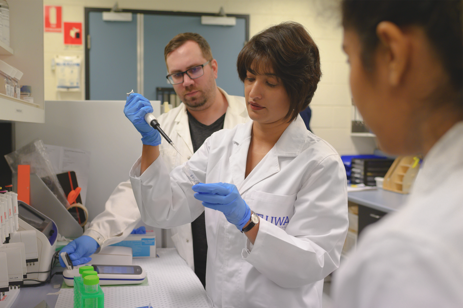 Dr. Kaur (center) with students in her lab at the University of Western Australia.
