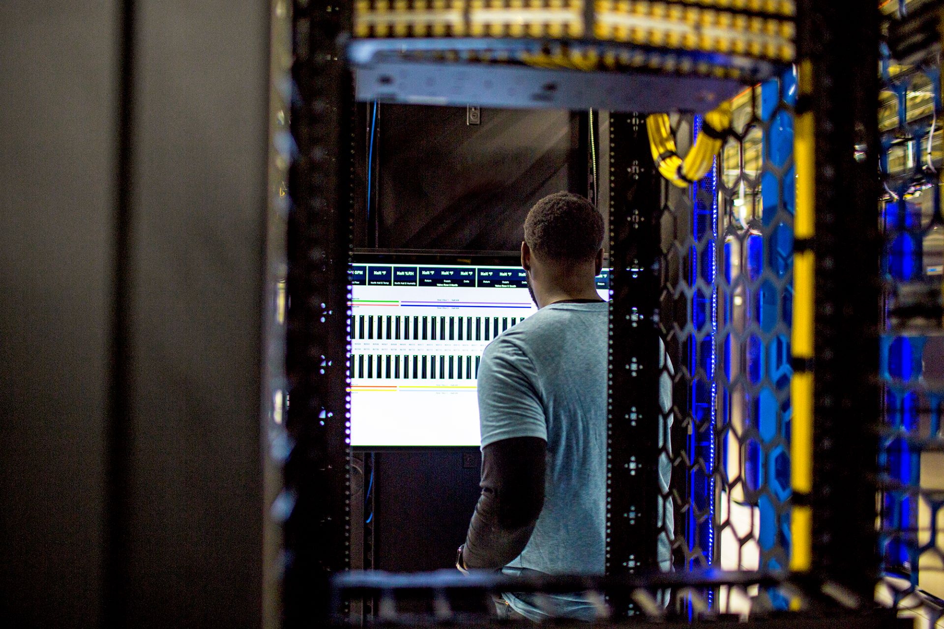 man working in a data centre