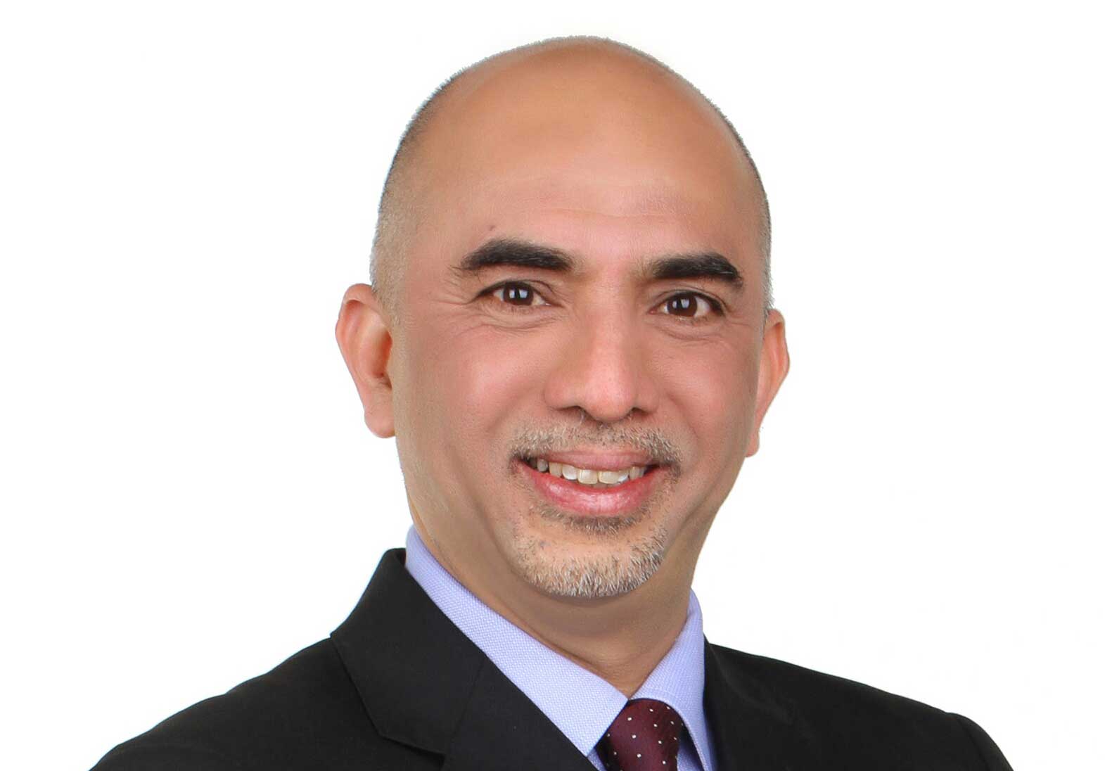 Profile Picture of K Raman, Managing Director of Microsoft Malaysia in Suit and Tie