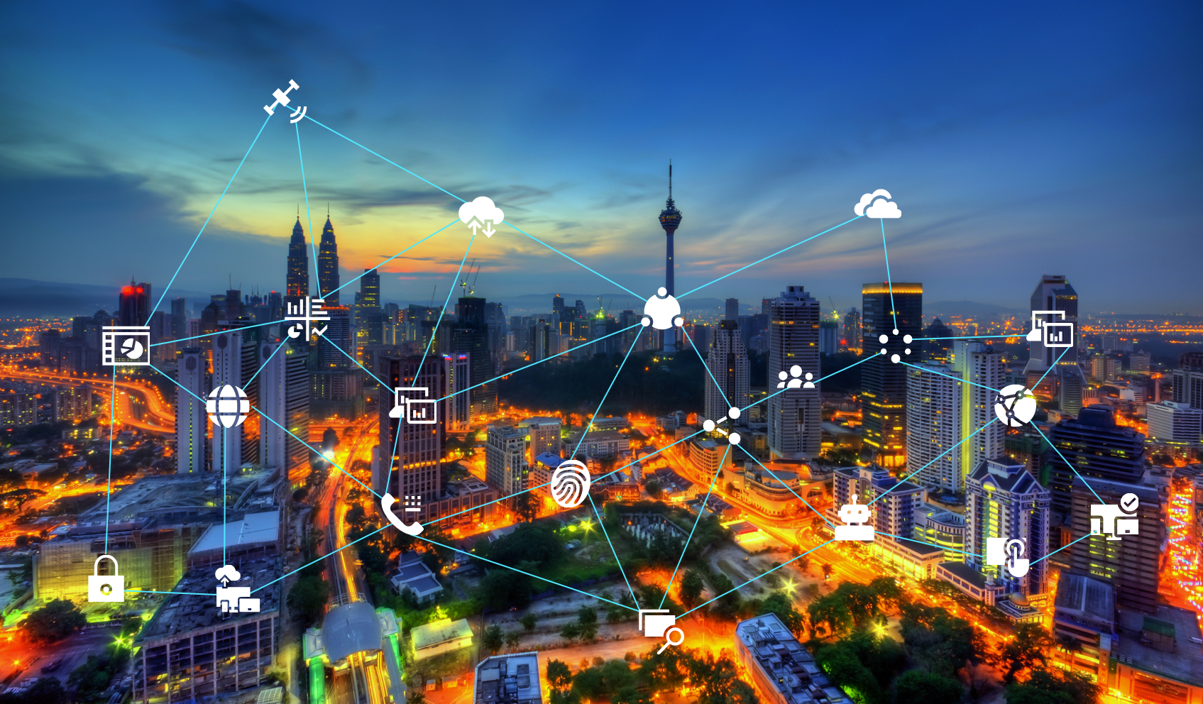 Kuala Lumpur Malaysia night skyline overlayed with technology icons to illustrate digital transformation