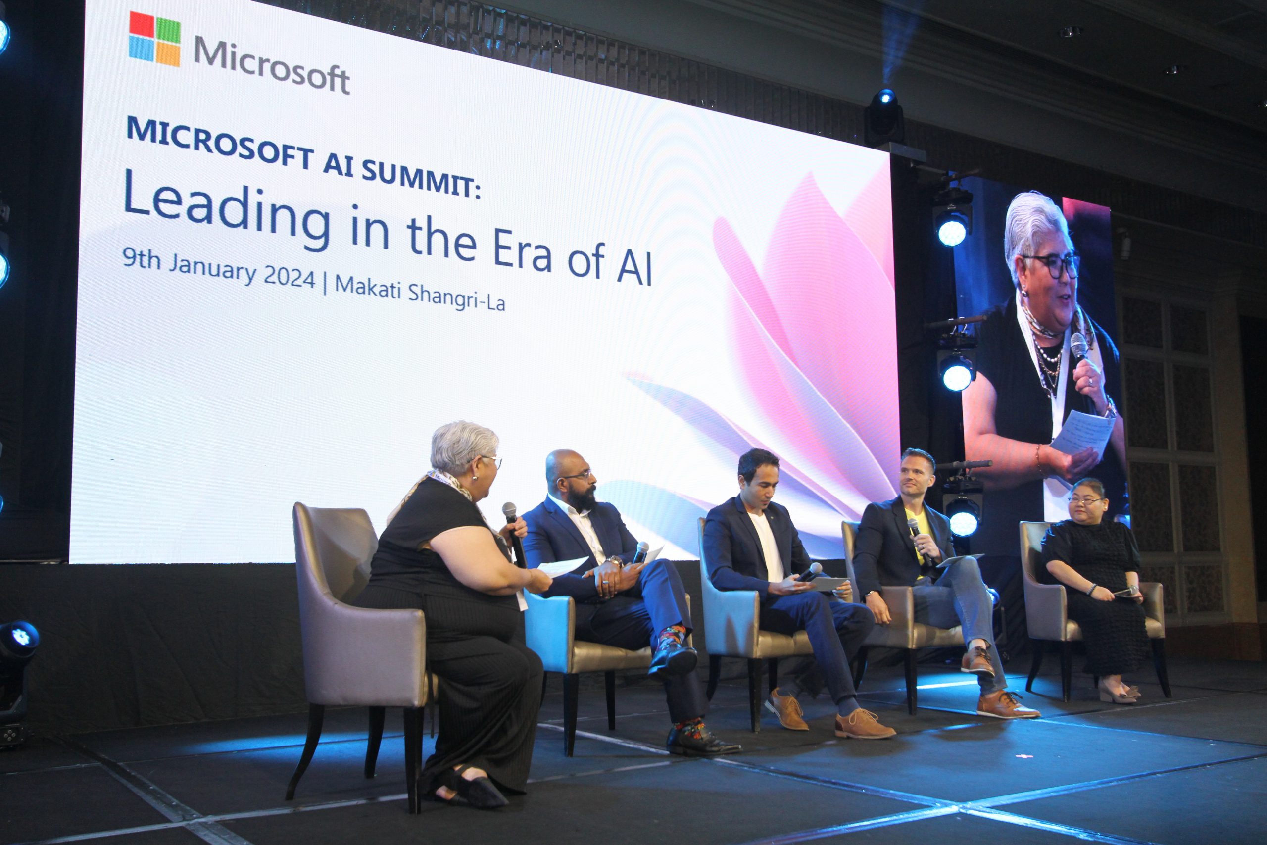 A panel of executives discussing AI at Microsoft Philippines' AI Summit event in January 2024.