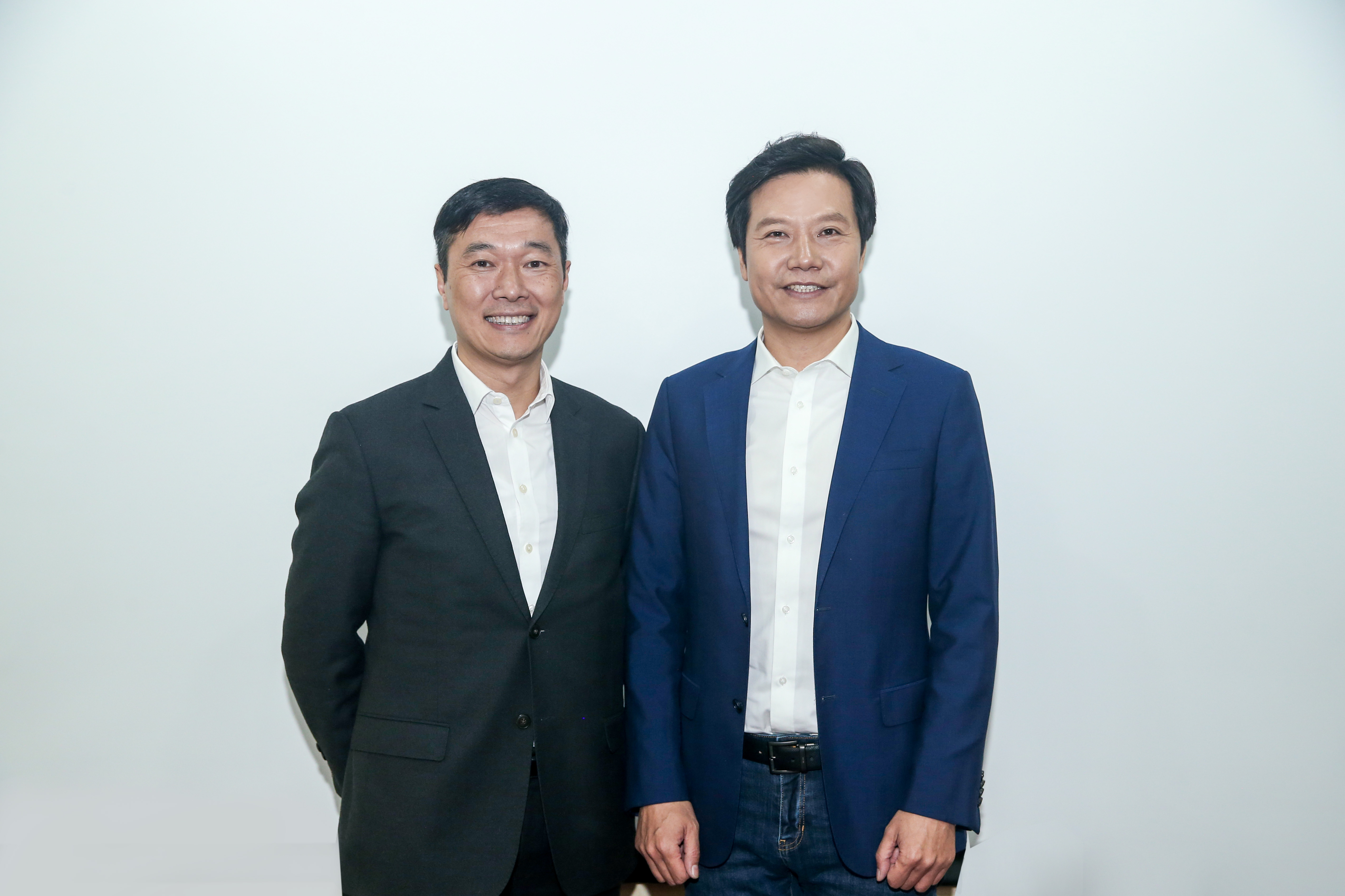 微软中国首席运营官邹作基与小米CEO雷军合影