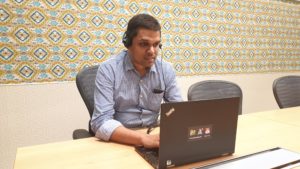 Shriram Parthasarthy, Social Media Lead, Microsoft India, working on his laptop