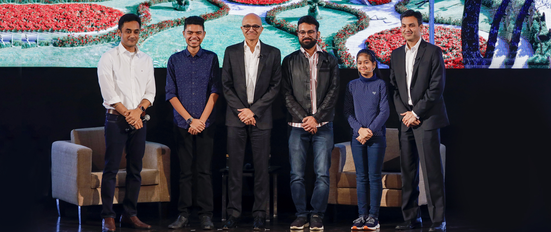 4 young innovators, Satya Nadella, CEO of Microsoft and Anant Maheshwari, President of Microsoft India posing for the camera