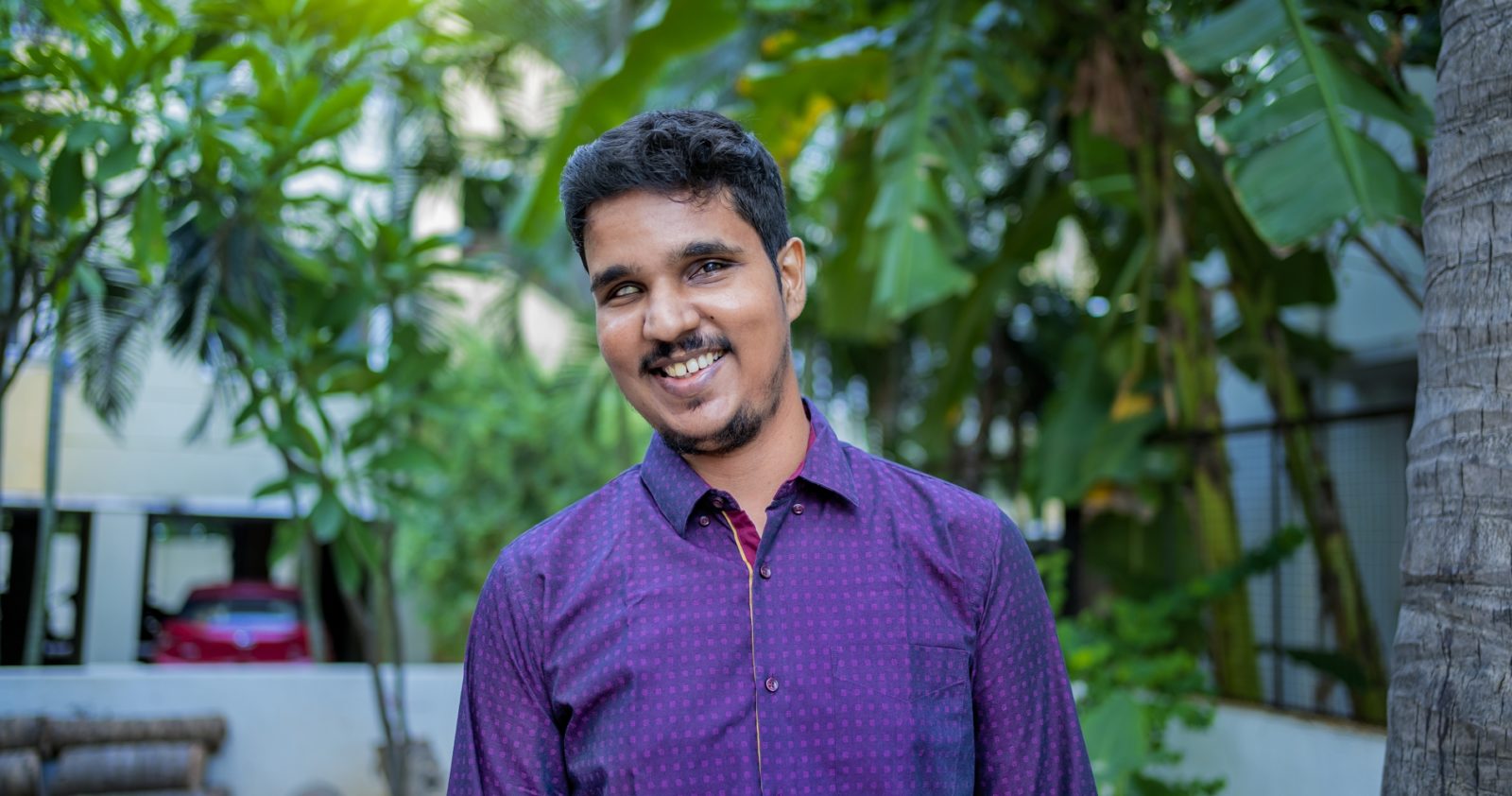 Photo of a man smiling at the camera