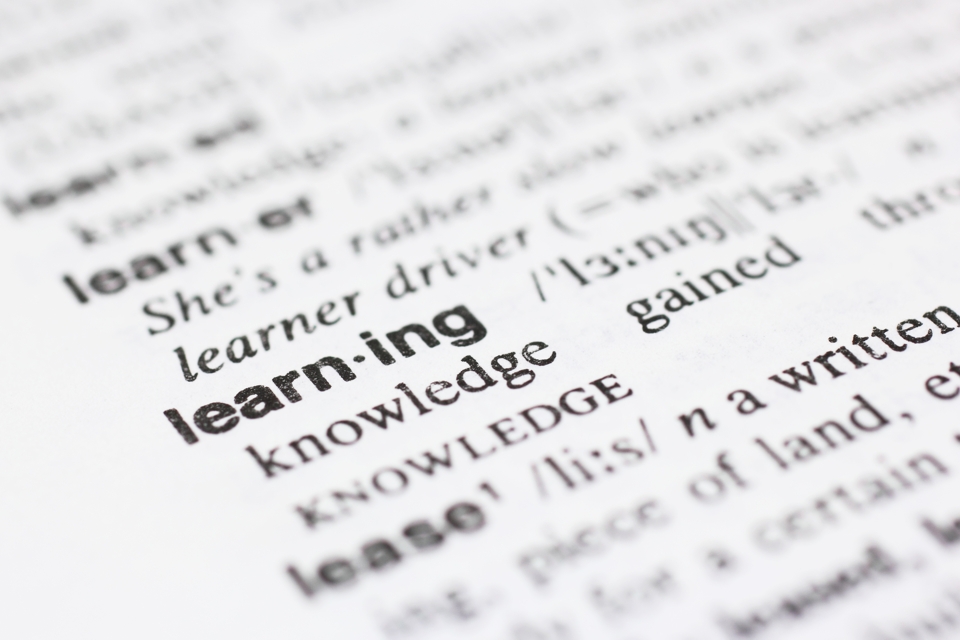 Image of the word learning typed on paper