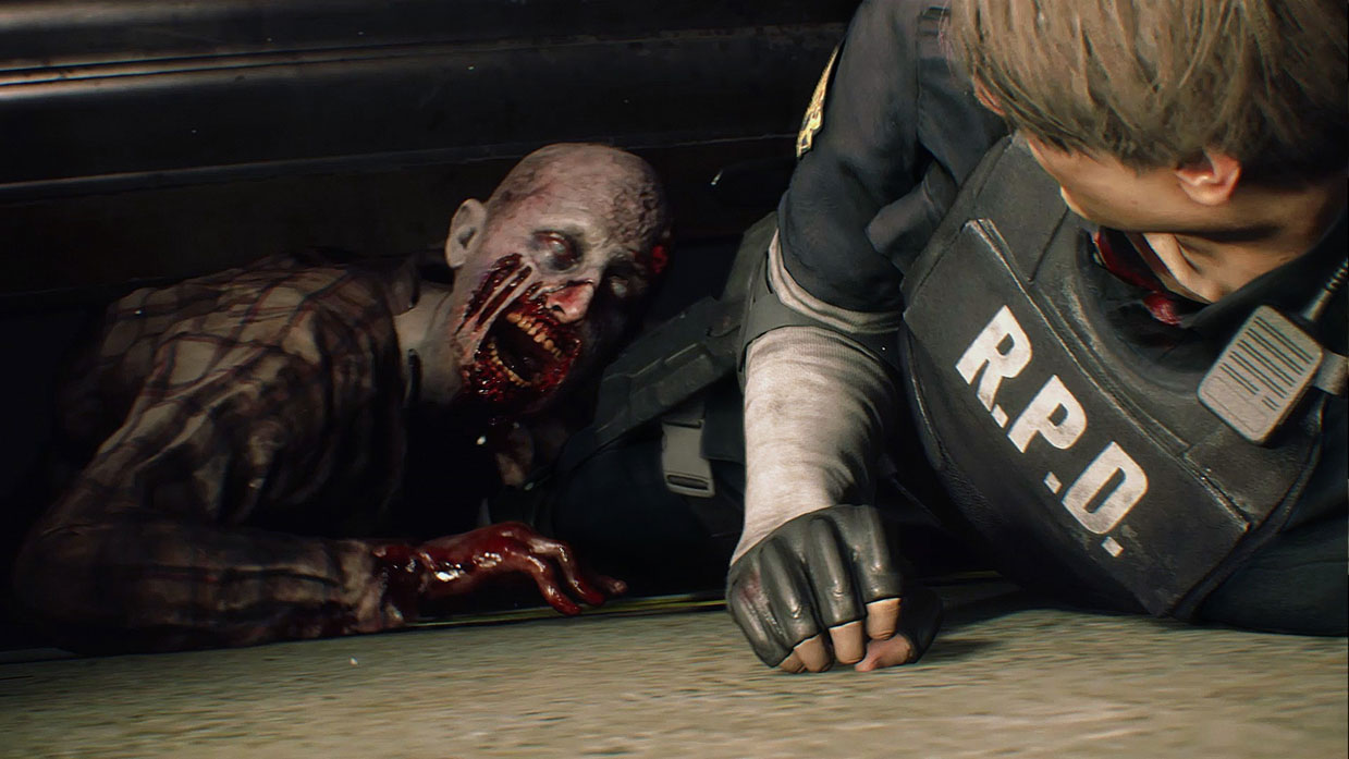 Зомби пожирает полицейского. Сцена из игры Resident Evil 2