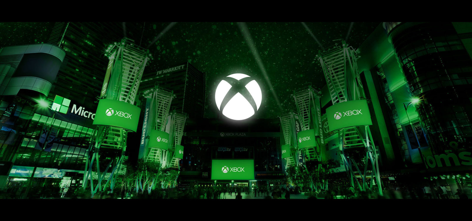 Логотип Xbox на фоне стилизованного черно-зеленого города - баннер к выставке E3