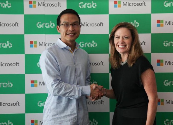 Representatives from Grab and Microsoft