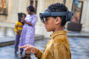 Kid with HoloLens on his head