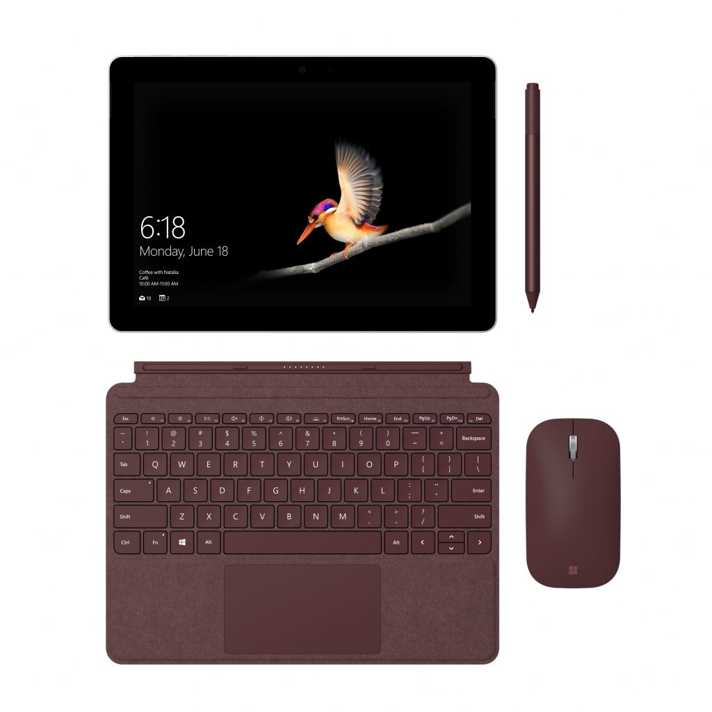 "Ein Bild des Surface Go mit der Tastatur, Maus und einem Pen"