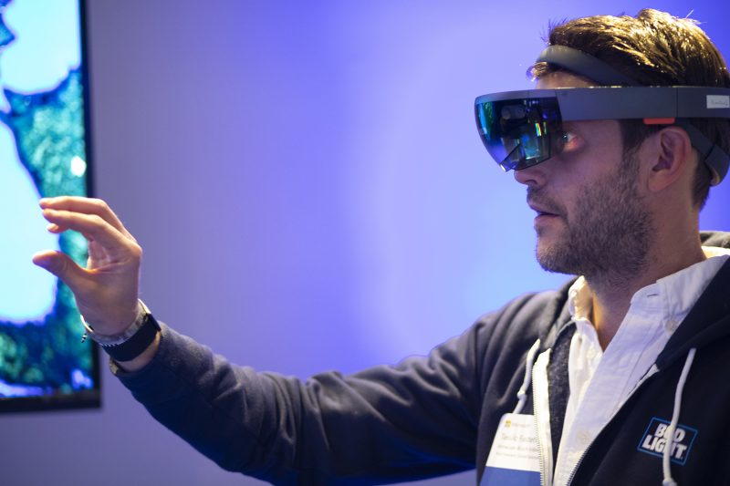 Anhueser-Busch InBev VP Tassilo Festetics tries out HoloLens at Conversations on AI, a Microsoft event in San Francisco, Calif.