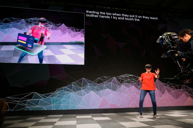 Microsoft Senior Researcher Julia Schwarz wears a HoloLens 2 on stage at MWC19 Barcelona