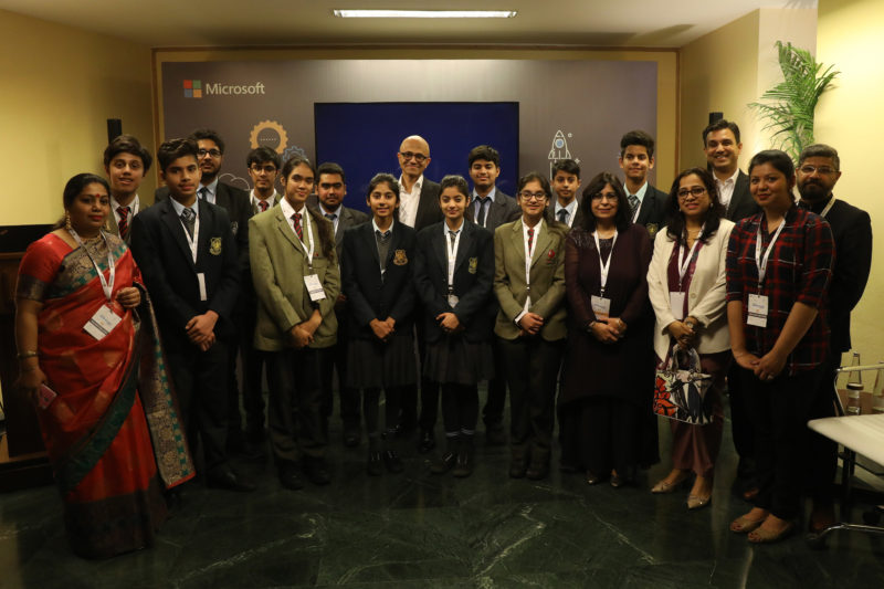Students and educators, along with Microsoft India President Anant Maheshwari and Microsoft CEO Satya Nadella, smiling at the camera.