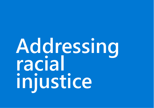 blue square with white text reading "addressing racial injustice"