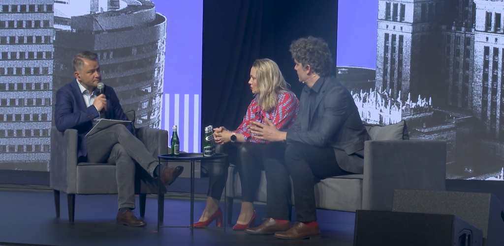 interview on the stage between 3 people