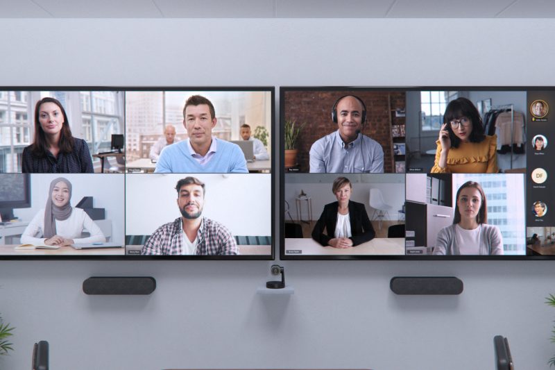 Two screens show eight people on video