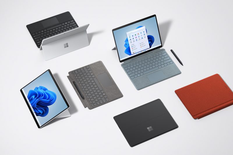Four Surface Pro X devices and accessories