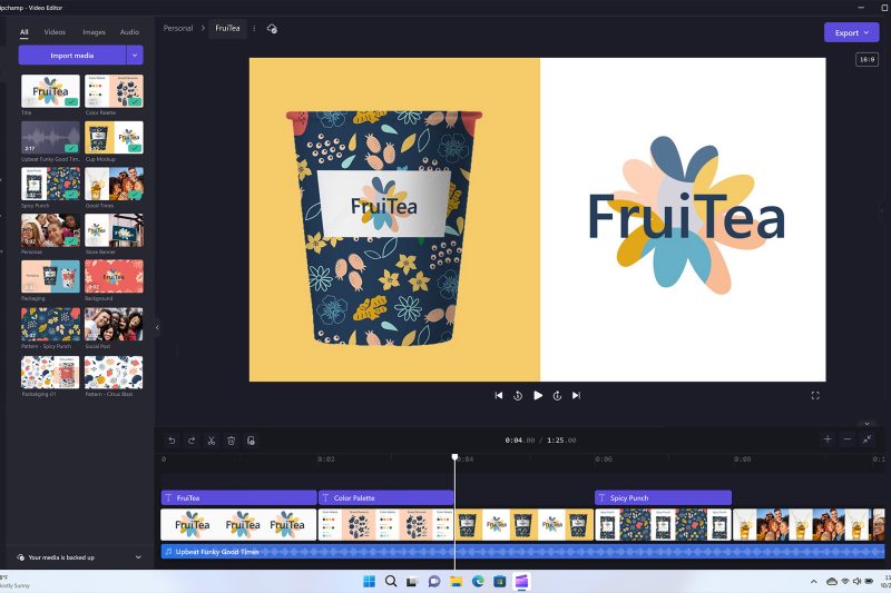 Clipchamp video editor screen with a view of someone using Clipchamp to create a video for FruiTea. Left side of the video edit has a yellow background with a multi-color FuiTea cup. Right side has a white background with a multi-color FruiTea logo.