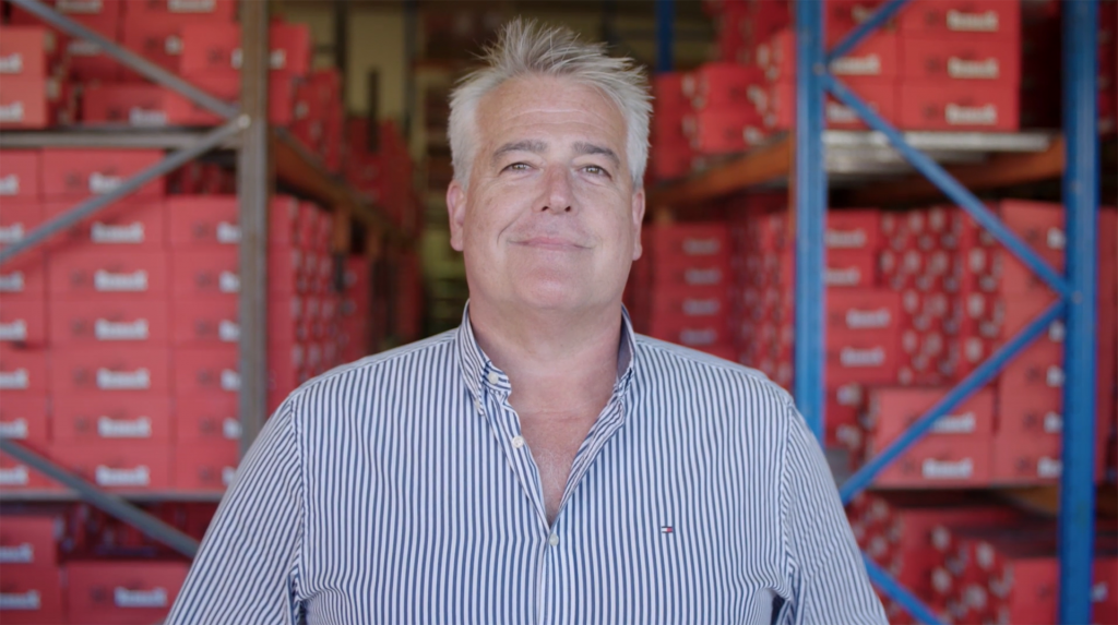 Mark Cloros, CEO Redback Boots in the warehouse.