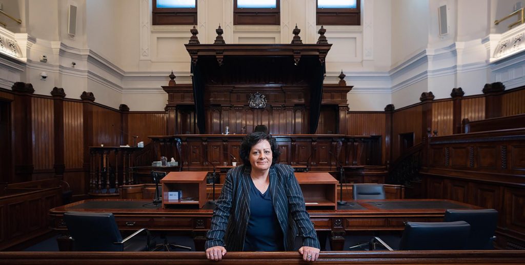 Pauline Diano, Program Director of Victoria's supreme court in the court room.