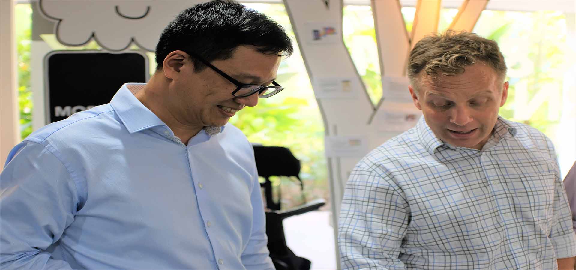 Justin Spelhaug (right) and Ng Herk Low, Assistant Chief Executive of SG Enable, at the Enabling Village in Singapore. Photo: Geoff Spencer