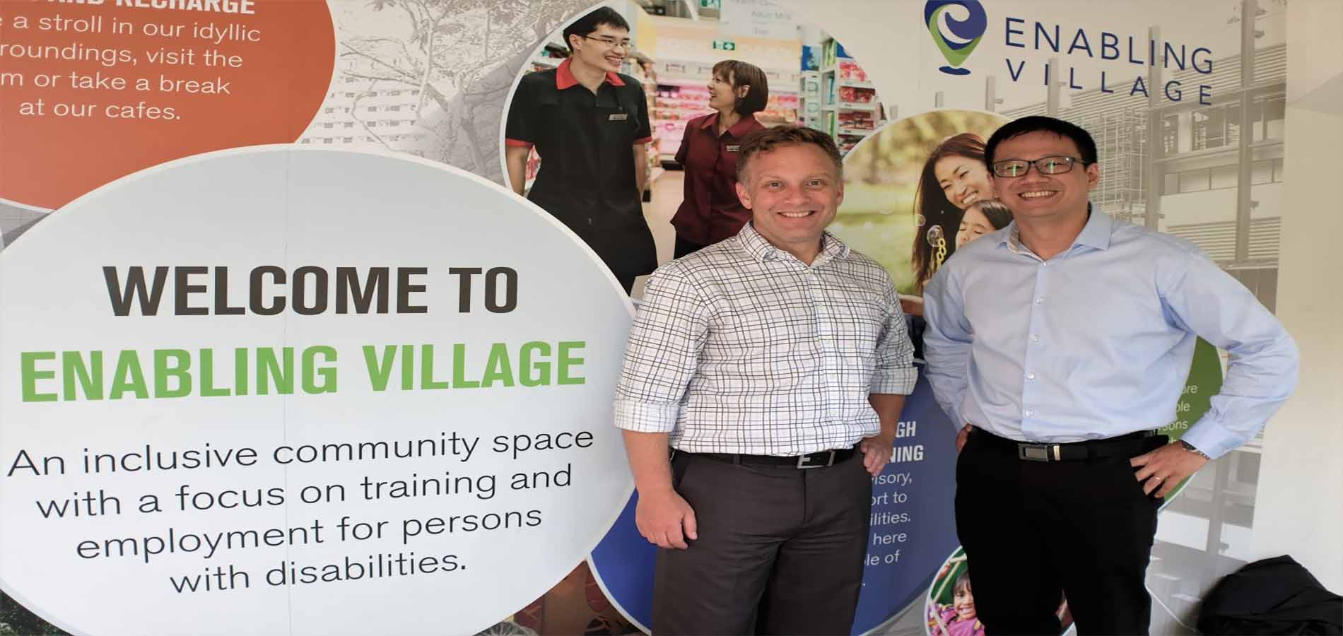 Justin Spelhaug (left) and Ng Herk Low, Assistant Chief Executive of SG Enable, at the Enabling Village in Singapore. Photo: Geoff Spencer