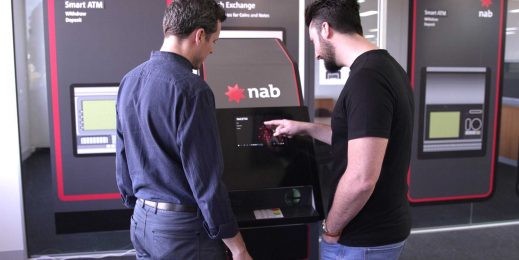 two men using a NAB ATM