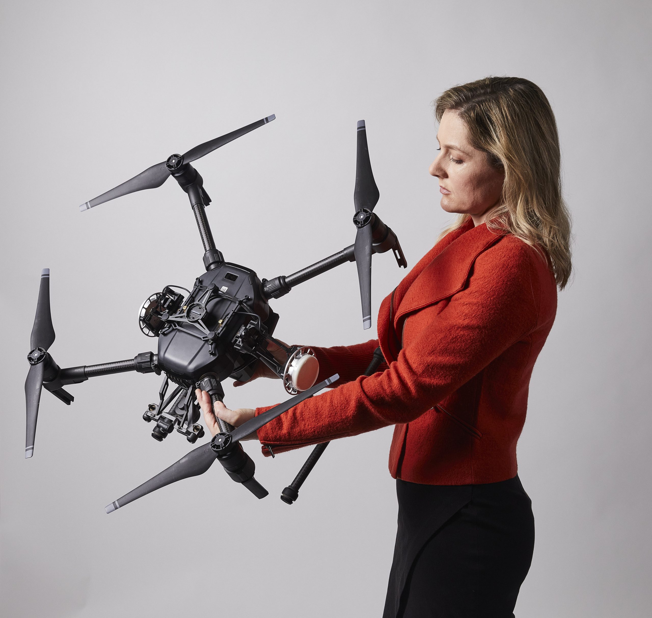 Portrait image of Fiona Church holding a drone