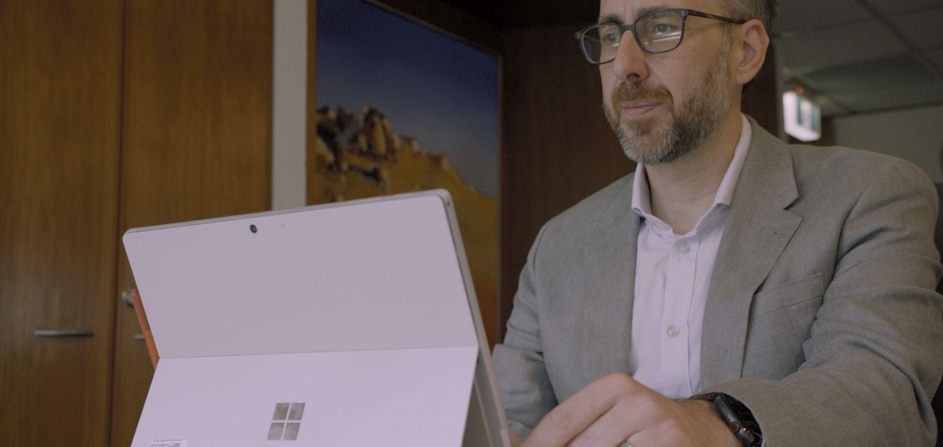 Adult male working on a Surface Laptop