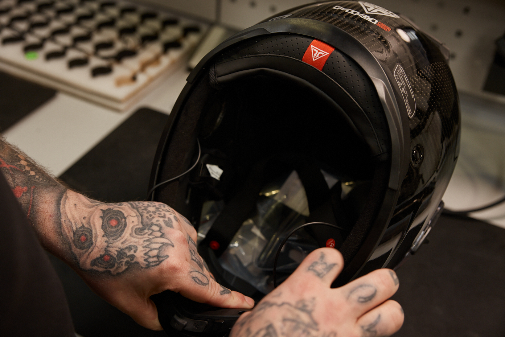 Close-up shot of the e-modular being attached inside the helmet