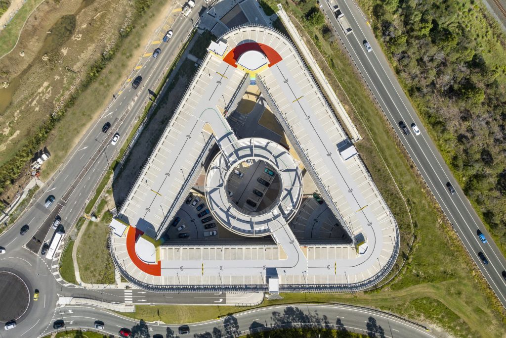 An aerial view of a triangular shaped building that represents GHD's park and ride building at Springfield. 