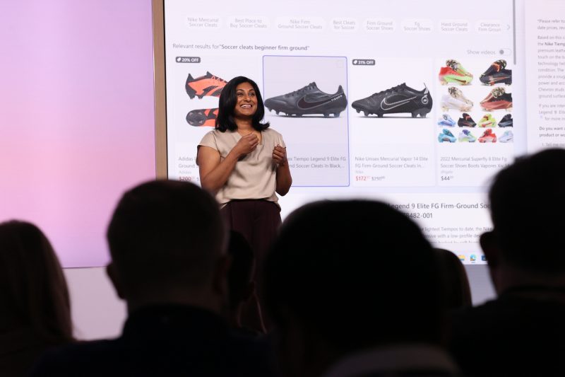 Image of Divya Kumar, Microsoft general manager of search and AI marketing, speaking on stage.