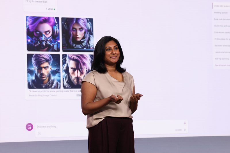 Image of Divya Kumar, Microsoft general manager of search and AI marketing, speaking on stage.