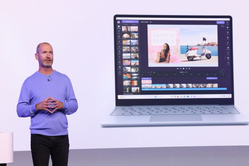 Image of Brett Ostrum, Microsoft corporate vice president for Surface devices, speaking on stag at Skylight at Essex Crossing in New York City.