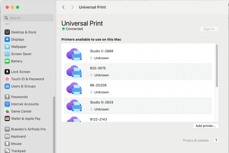 Screenshot of Universal Print settings on a macOS device showing that Universal Print is connected and listing several printers available to use on the device