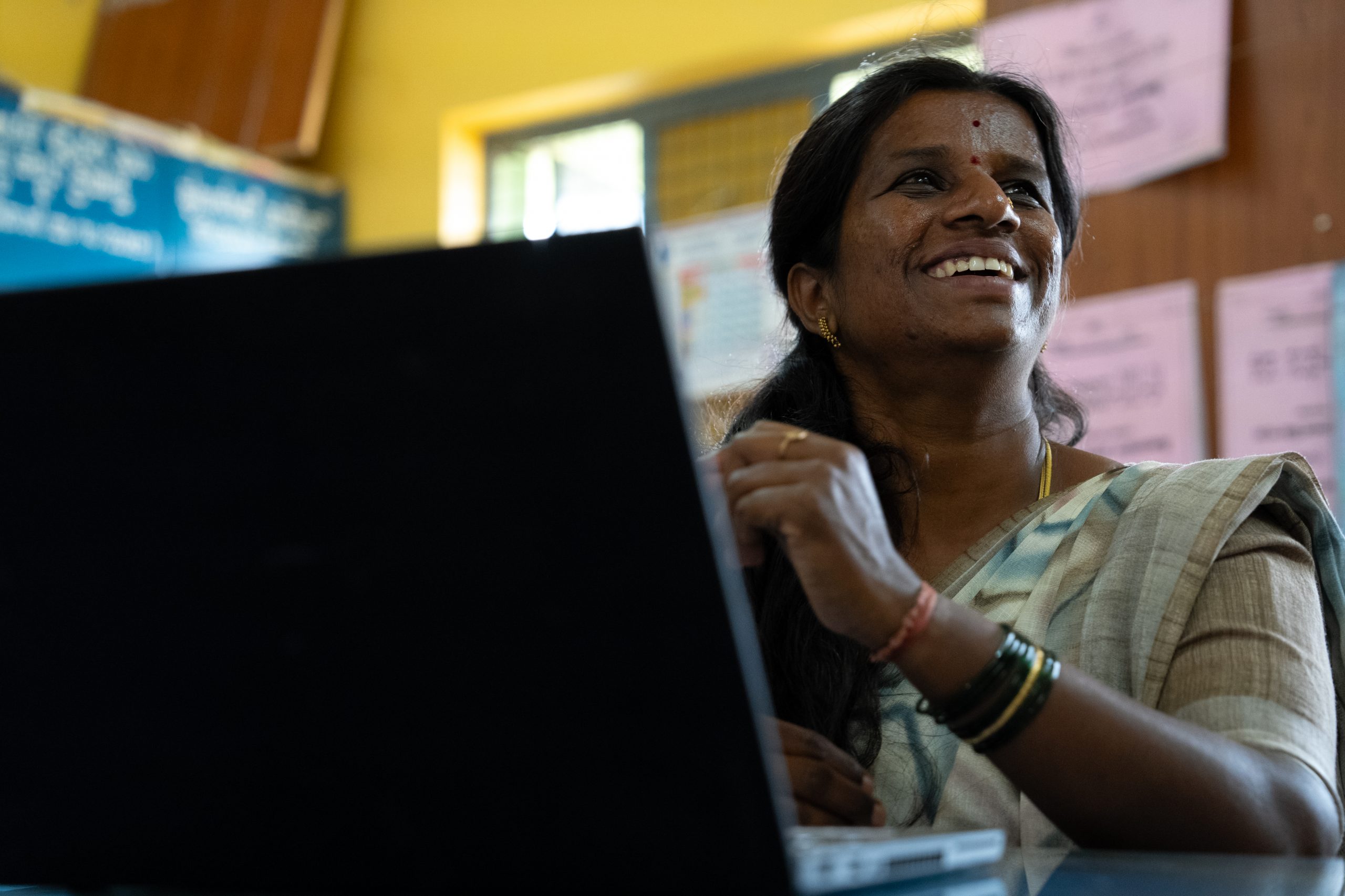 A female teacher at her laptop