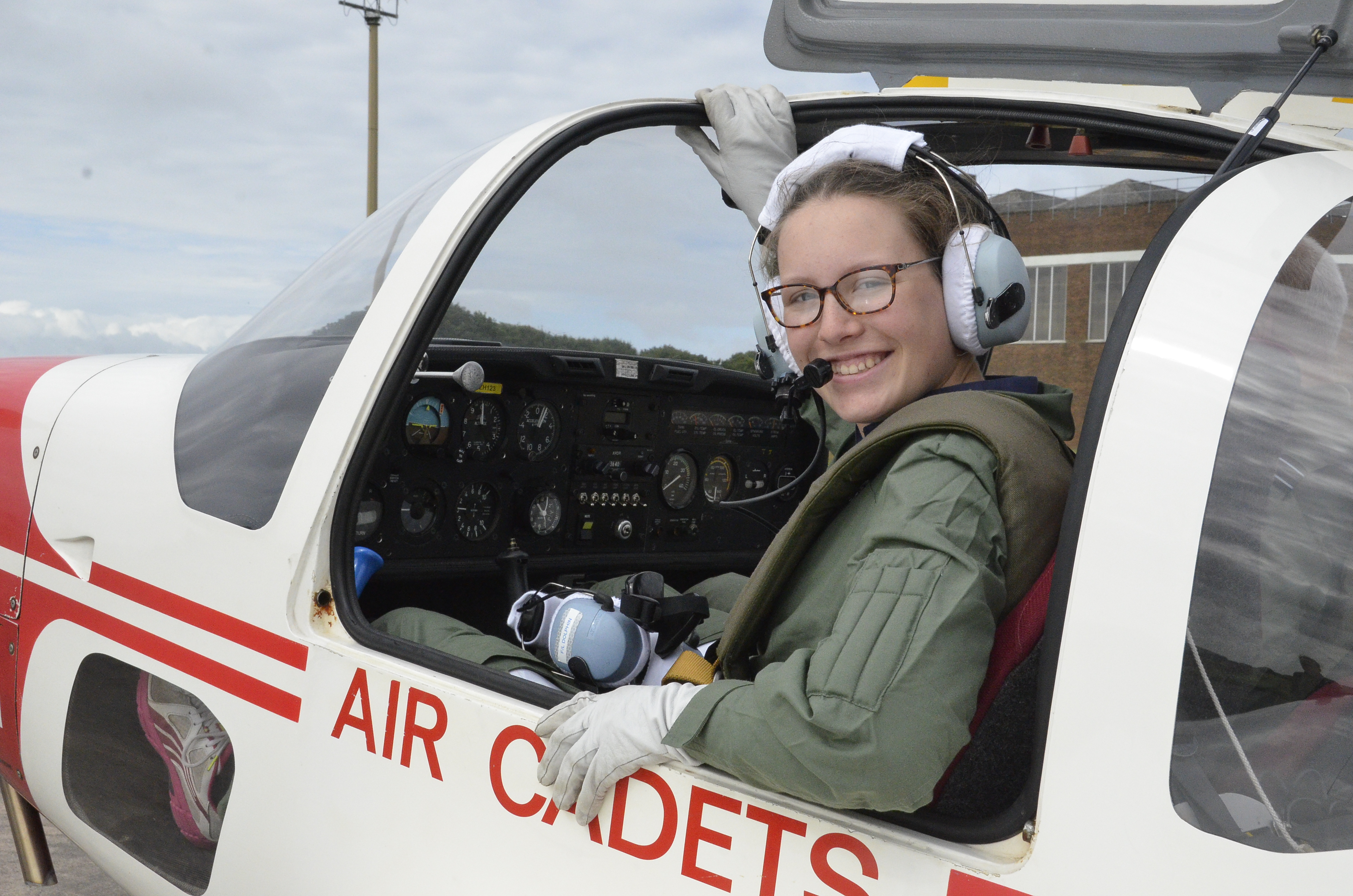 Female Air Cadet sat in glider