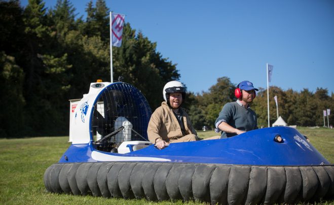 Andrew Trotman takes part in the Hovercraft versus Raptor race