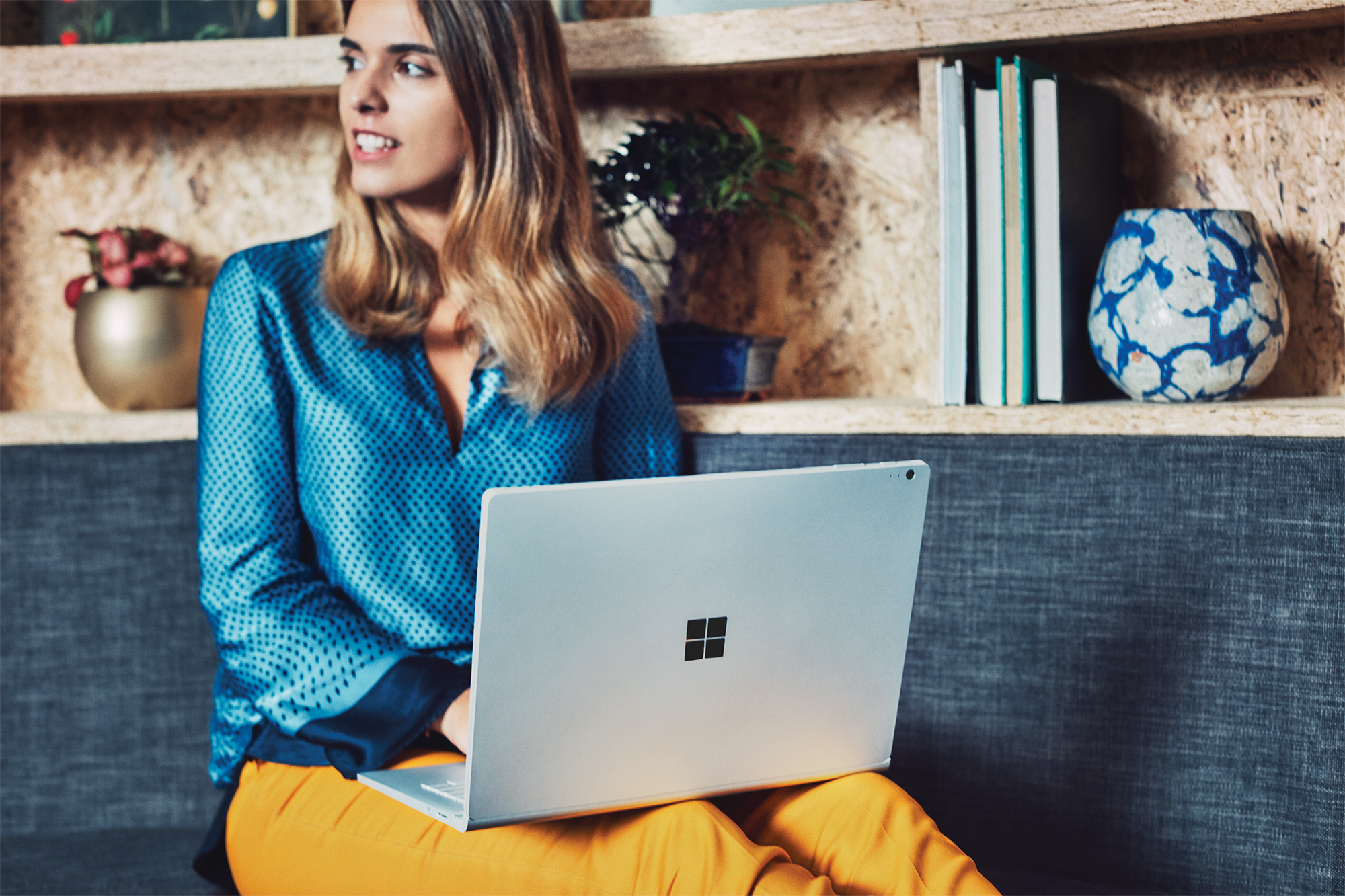 Woman using Surface Book 2