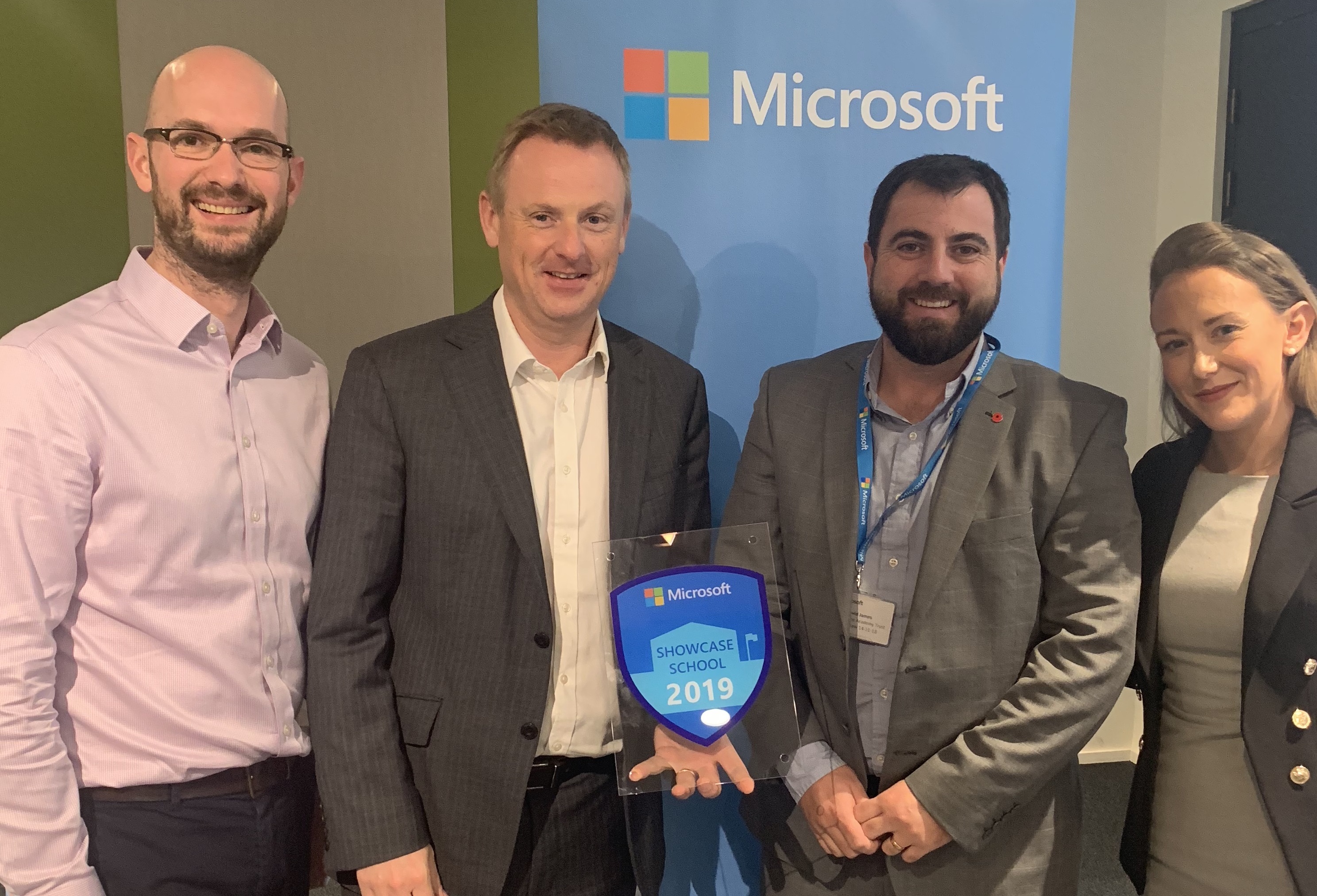 Chris Rothwell (far left) with Jonathan Bishop, Headteacher of Broadclyst Primary School; David James, Deputy Chief Executive of Broadclyst; and Tina Jones, UK Education Manager at Microsoft